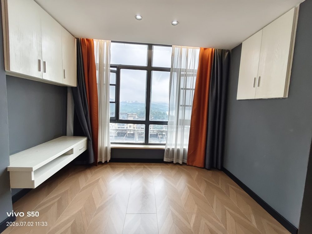 Penli Plaza rental apartment — living area with city view