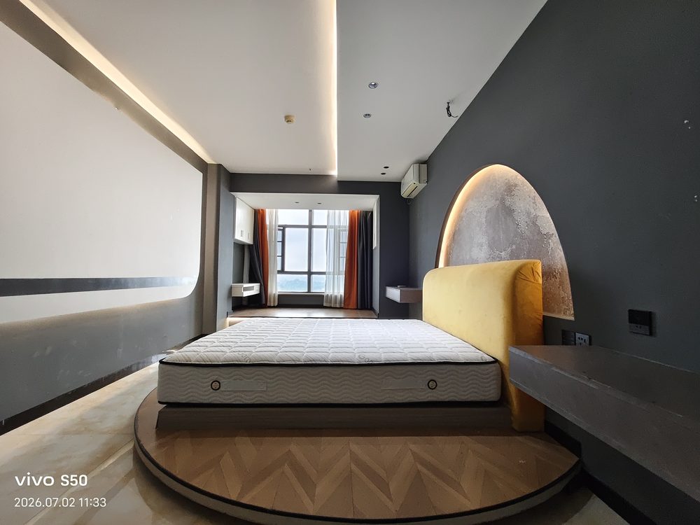 Penli Plaza rental apartment — bedroom feature wall